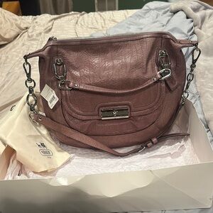 Coach Pink Shoulder Bag with Silver Hardware and Flap Closure